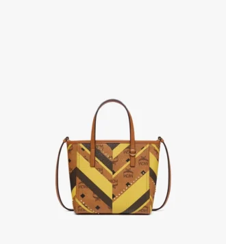 Studded Toni Top-Zip Shopper in Mega Herringbone Visetos Studded Toni Top-Zip Shopper in Mega Herringbone Visetos